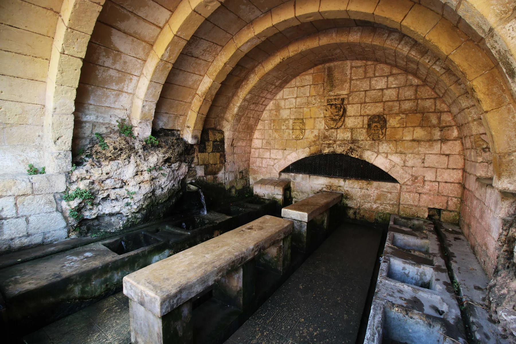 The arched historic wash-house at L-Għajn il-Kbira in Fontana, Gozo