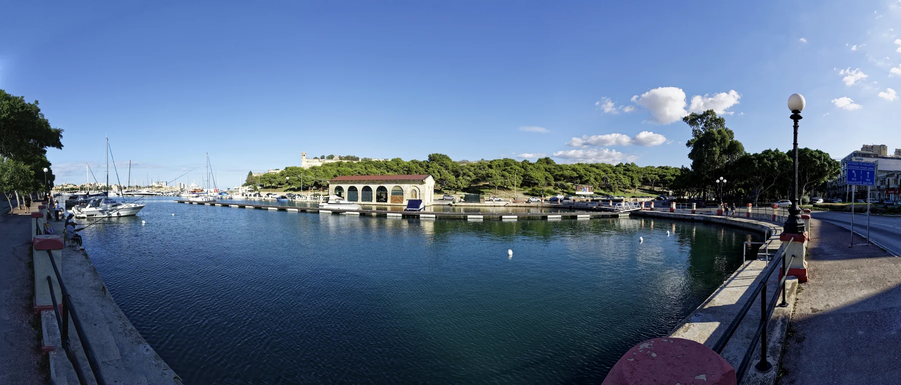 Wide view across the lower Pietà waterfront and Marsamxett Harbour
